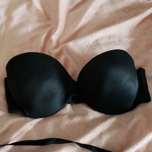 Black strapless padded push up bra .